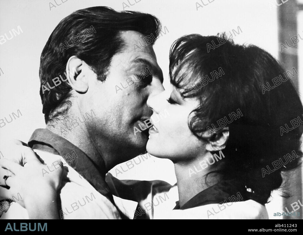 ANNA KARINA and MARCELLO MASTROIANNI in THE STRANGER, 1967 (LO STRANIERO), directed by LUCHINO VISCONTI. Copyright PARAMOUNT PICTURES.