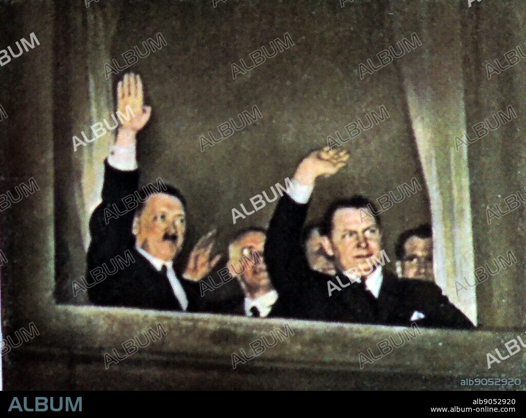 Herman Goring Right and Adolf Hitler left wave to supporters from a window at the Reichs Chancellor's office after Hitler was appointed Chancellor of Germany in 1933. Rudolf Hess later Hitler's deputy is depicted at the far right.