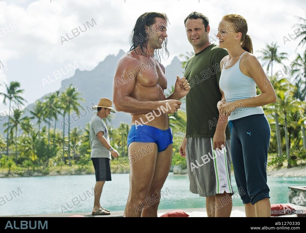 CARLOS PONCE, MALIN AKERMAN and VINCE VAUGHN in COUPLES RETREAT, 2009, directed by PETER BILLINGSLEY. Copyright STUBER PROD./WILD WEST PICTURE SHOW PRODUCTIONS.