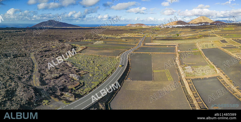 Aerial view of road through volcanic landscape, Timanfaya National Park, Lanzarote, Las Palmas, Canary Islands, Spain, Atlantic, Europe.