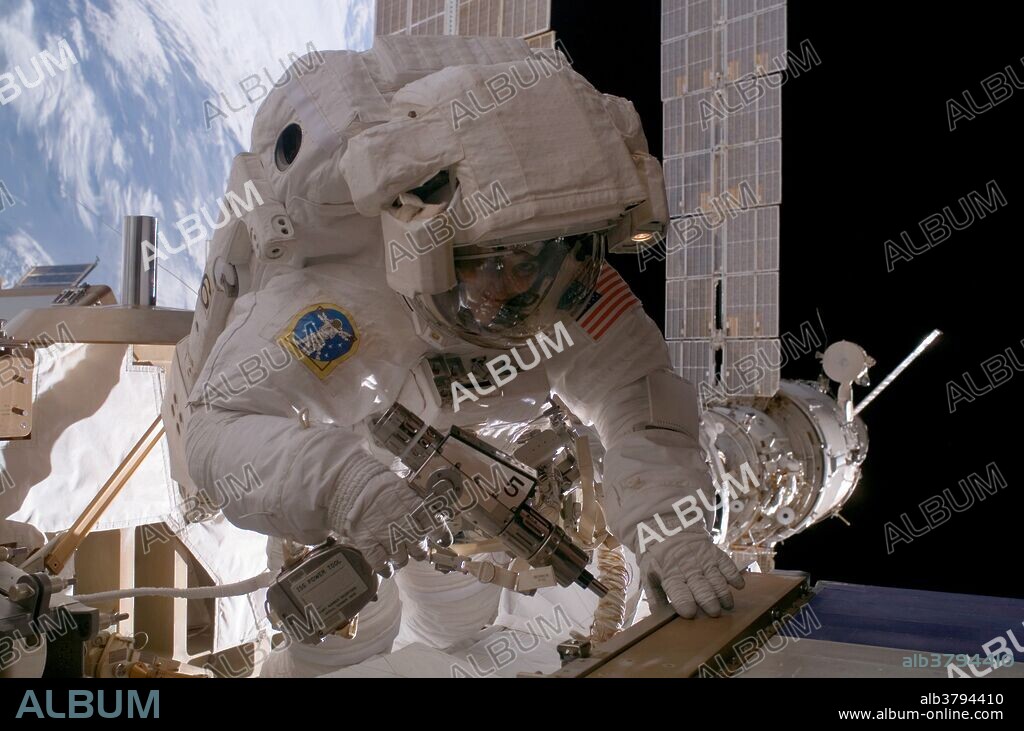 Astronaut Sunita L. Williams, Expedition 14 flight engineer, used a pistol grip tool as she worked on the International Space Station in the first of three spacewalks slated to occur over a nine-day period. During the 7-hour 55-minute spacewalk that took place on Jan. 31, 2007, Williams and station commander Michael E. Lopez-Alegria (out of frame) reconfigured one of two cooling loops for the Destiny laboratory module, rearranged electrical connections and secured the starboard radiator of the P6 truss after retraction.