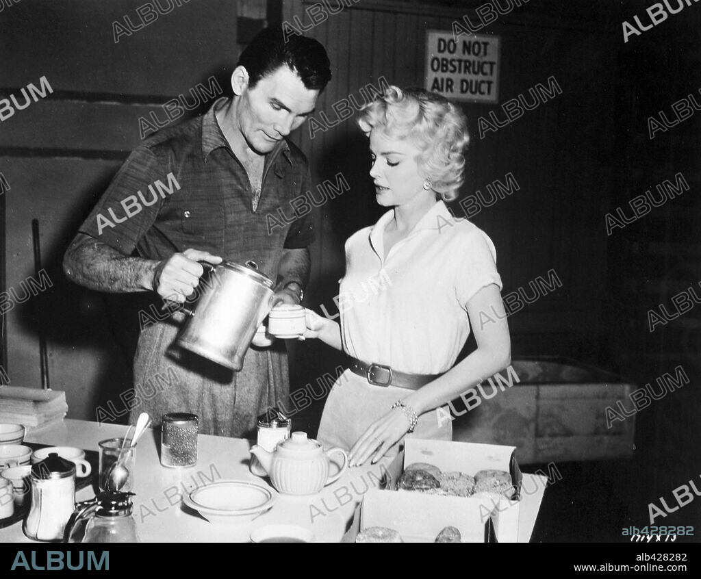 BARBARA LANG and JACK PALANCE in HOUSE OF NUMBERS, 1957, directed by RUSSELL ROUSE. Copyright M.G.M.