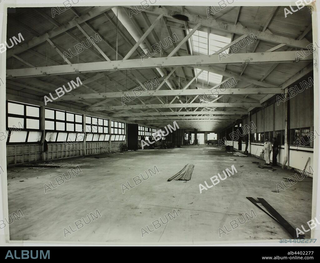 Photograph - Hecla Electrics Pty Ltd, Factory Premises, 1920s, Black and white photograph of an empty factory floor, possibly Hecla's Little Bourke Street site. This photograph is from an album containing 255 black and white photographs depicting electrical appliances, showroom displays, factory interiors and advertising material relating to Hecla Electrics Pty Ltd. It is part of the Hecla collection of photographs, documents, products, manuals.
