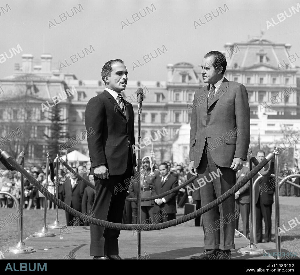 U.S. President Richard Nixon and King Hussein of Jordan standing on raised platform in front of Old Executive Office Building, Washington, D.C., USA, Robert H. McNeill, Robert H. McNeill Family Collection, April 8, 1969.