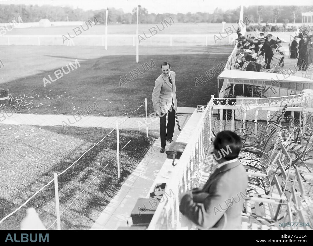Madrid. May 1915. At the Casa de Campo Pigeon Shoot. HM the King at the end of the brilliant shooting in which he killed eleven birds in a row.