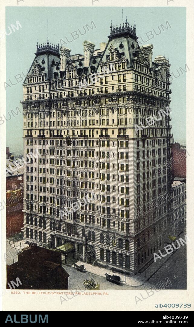 Bellevue-Stratford Hotel, Philadelphia, Pennsylvania, USA, 1905. Vintage postcard showing the exterior of the hotel. The corner of Broad and Walnut Streets is also visible. The hotel was designed in French Renaissance style by Philadelphia architects GW and WD Hewitt. It opened in 1904 and quickly became the focal point of the cultural, social and business life of Philadelphia's elite. In 1976 it became notorious as the site of the first recorded outbreak of Legionnaire's disease, which killed 34 members of the American Legion who had attended a convention at the hotel.