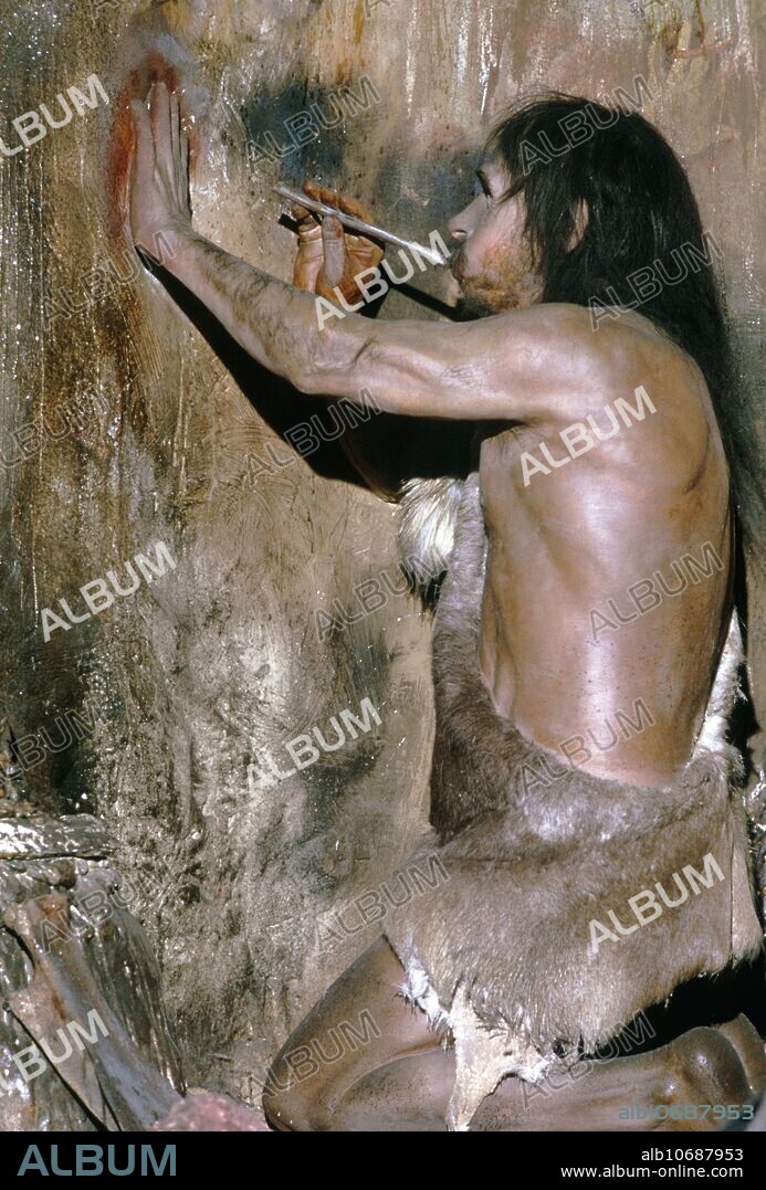 Cave painting. Model of a Cro-Magnon man, a type of early modern human (Homo sapiens sapiens), painting the outline of his hand on a cave. Cave paintings first appeared in Europe around 35,000 years ago. Cro-Magnons lived in Europe, northern Africa and southern Asia from 50,000 years ago. Cro-Magnons are so-called due to discoveries made in a rock shelter of that name in France.