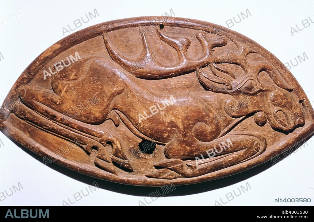 Scythian wooden facing of a saddle-arch from a Scythian burial mound, Altai region, Russia. from the Hermitage Museum's collection in St Petersburg, 5th century BC.