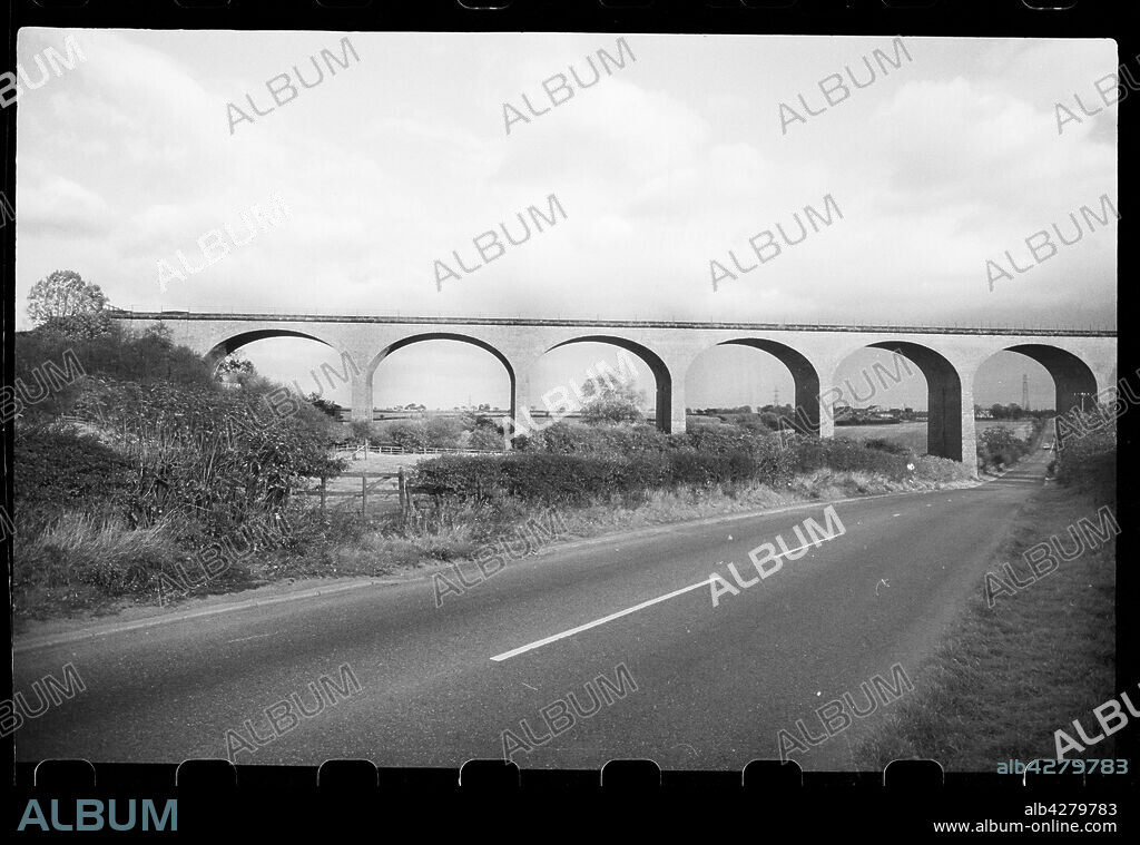 URSULA CLARK. Thorpe Thewles Railway Viaduct, Grindon, Stockton-on-Tees, c1955-c1979. A general view of the viaduct, which carried the Stockton and Castle Eden Bridge Railway. The viaduct was built in 1877 and consisted of two sections, a small three-arch span, which was demolished April 1979, and a longer span between 16 and 20 arches, demolished in June 1979. The Stockton and Eden Castle railway line was closed in 1951 and only carried passengers until 1931 on the line to Wellfield.