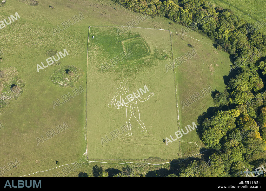 HISTORIC ENGLAND. The Cerne Abbas Giant chalk hill figure and The Trendle enclosure earthwork on Giant Hill, Cerne Abbas, Dorset, 2015.