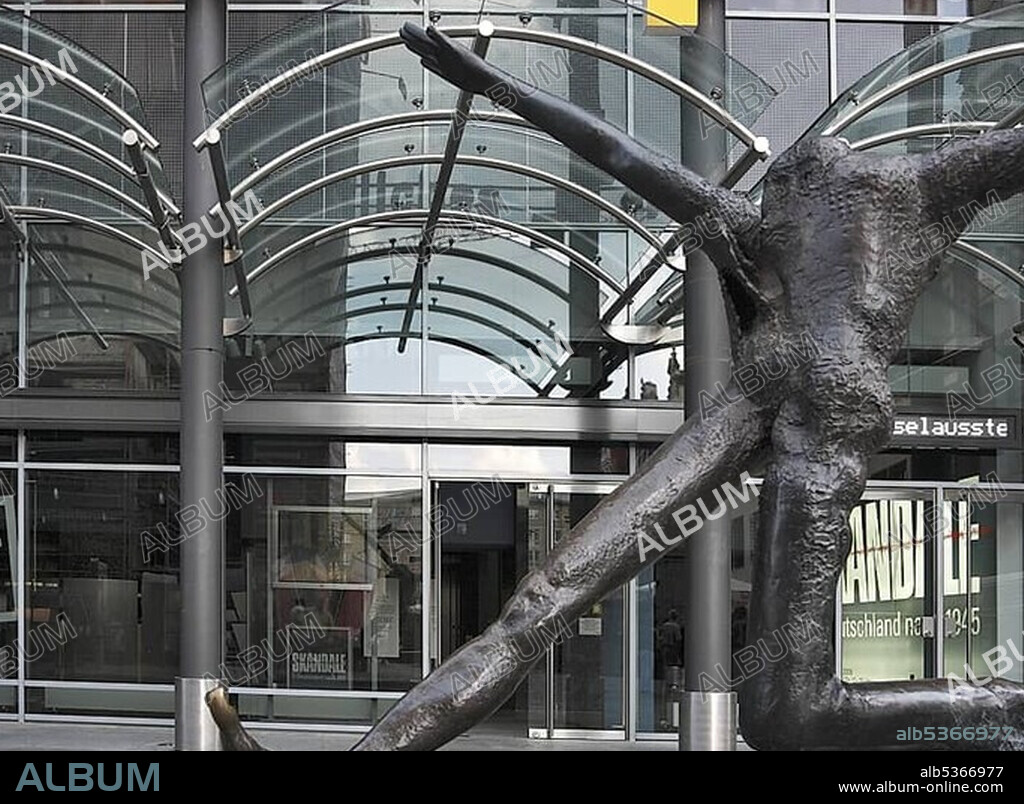 Der Jahrhundertschritt, the Century Step, by Wolfgang Mattheuer at the entrance to the Forum of Contemporary History, Zeitgeschichtliches Forum, Leipzig, Saxony, Germany, Europe.