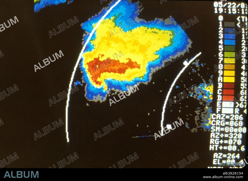 A tornado is a violent, dangerous, rotating column of air that is in contact with both the surface of the earth and a cumulonimbus cloud or, in rare cases, the base of a cumulus cloud. They are often referred to as a twister or a cyclone, although the word cyclone is used in meteorology in a wider sense, to name any closed low pressure circulation. Tornadoes come in many shapes and sizes, but are typically in the form of a visible condensation funnel, whose narrow end touches the earth and is often encircled by a cloud of debris and dust. Most tornadoes have wind speeds less than 110 miles per hour (177 km/h), are approximately 250 feet (80 m) across, and travel a few miles (several kilometers) before dissipating. The most extreme tornadoes can attain wind speeds of more than 300 mph (480 km/h), stretch more than two miles (3 km) across, and stay on the ground for dozens of miles (more than 100 km). A Doppler radar is a specialized radar that makes use of the Doppler effect to produce velocity data about objects at a distance. It does this by beaming a microwave signal towards a desired target and listening for its reflection, then analyzing how the frequency of the returned signal has been altered by the object's motion. This variation gives direct and highly accurate measurements of the radial component of a target's velocity relative to the radar. Image from the Binger Doppler Radar showing characteristic hook echo of tornado. Binger, Oklahoma, May 22, 1981.