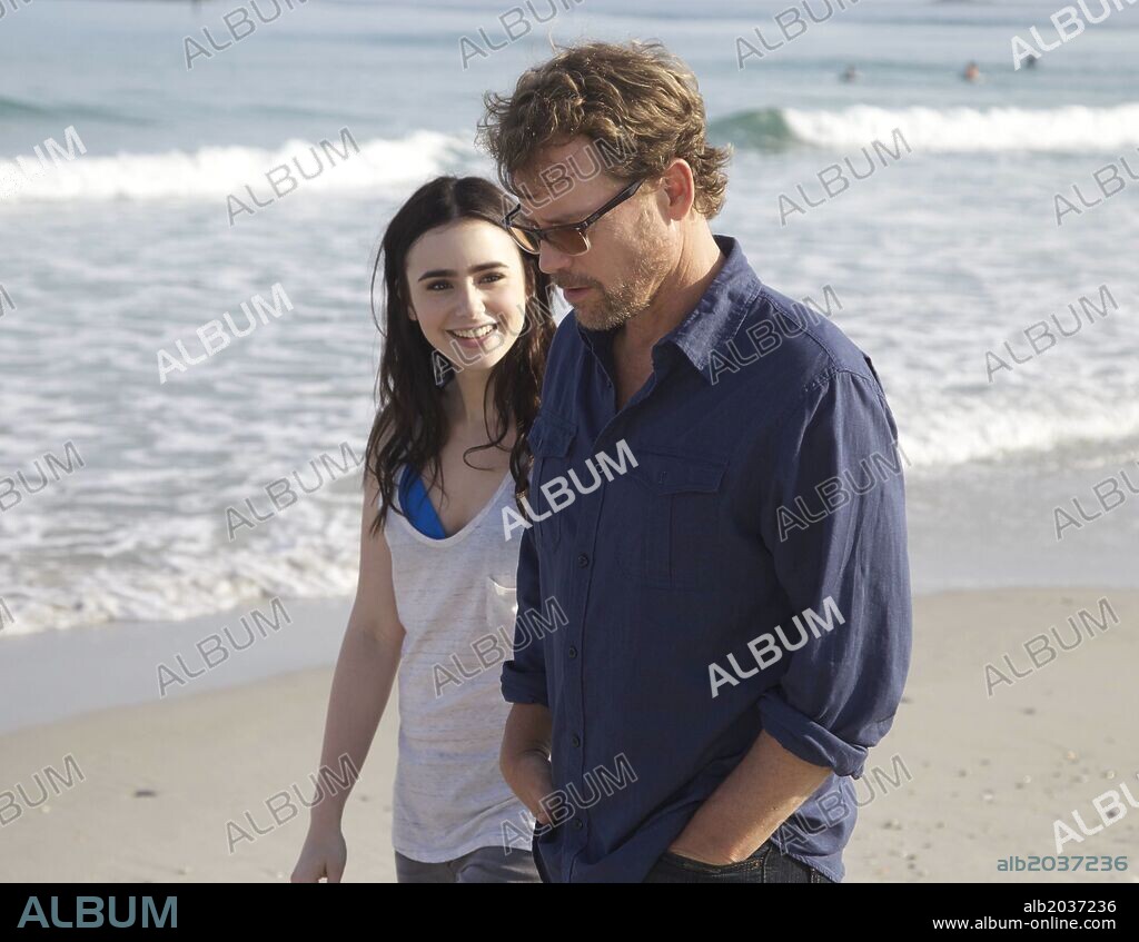GREG KINNEAR and LILY COLLINS in STUCK IN LOVE, 2012, directed by JOSH BOONE. Copyright INFORMANT MEDIA.