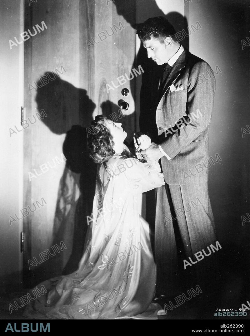 BARBARA STANWYCK y BURT LANCASTER en VOCES DE MUERTE, 1948 (SORRY WRONG NUMBER), dirigida por ANATOLE LITVAK. Copyright PARAMOUNT PICTURES.