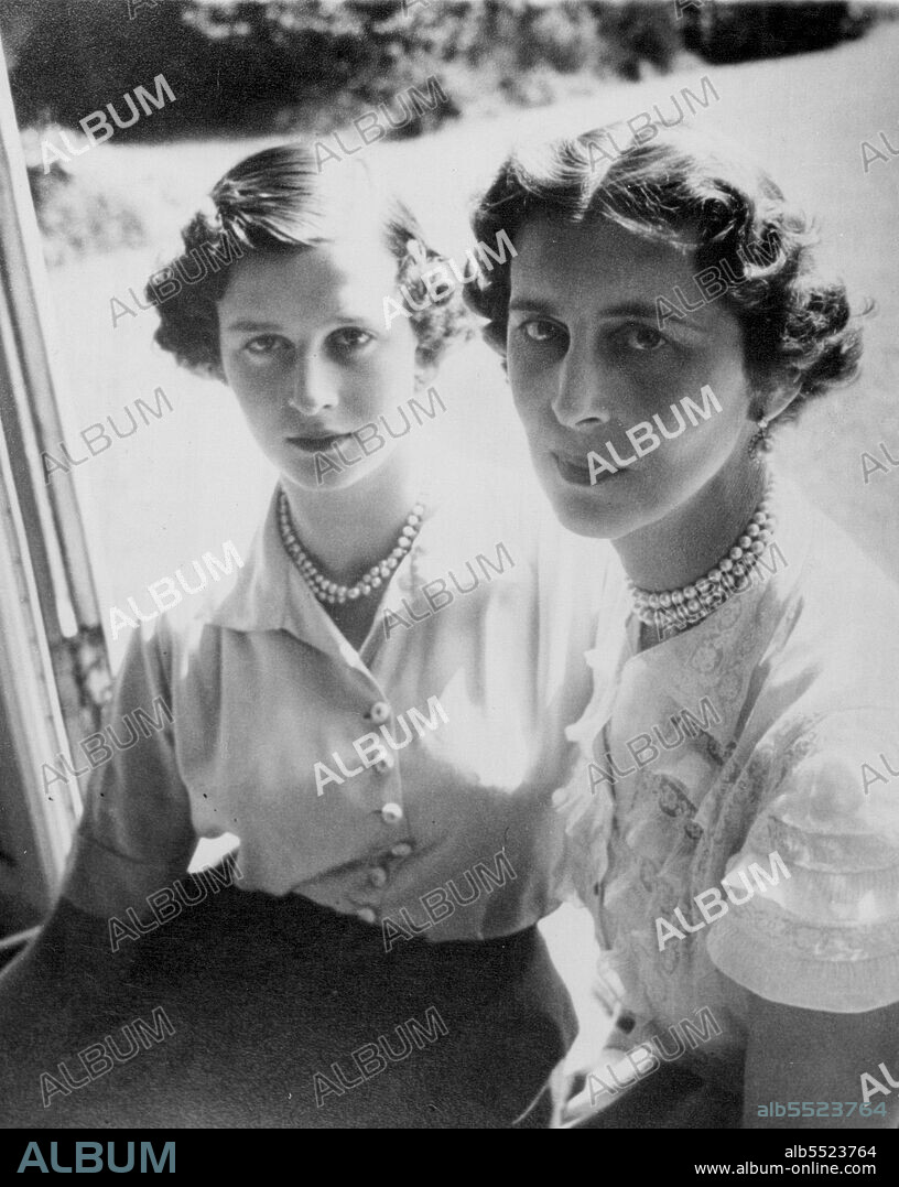 Duchess of Kent and her Daughter - New Picture -- The Duchess of Kent and her 15-year-old daughter, Princess Alexandra, are seen in the garden of their home here in this new picture taken by Baren. June 02, 1952.