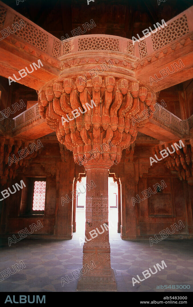 The Diwan-i-Khas, or Hall of Private Audience, is a plain square building with four chhatris on the roof. It is famous for its central pillar, which has a square base and an octagonal shaft, both carved with bands of geometric and floral designs, further its thirty-six serpentine brackets support a circular platform for the Mughal emperor Akbar, which is connected to each corner of the building on the first floor, by four stone walkways. It is here that Akbar had representatives of different religions discuss their faiths and gave private audience. Fatehpur Sikri (the City of Victory) was built during the second half of the 16th century by the Emperor Akbar (r. 1556-1605). It was the capital of the Mughal Empire for 10 years.