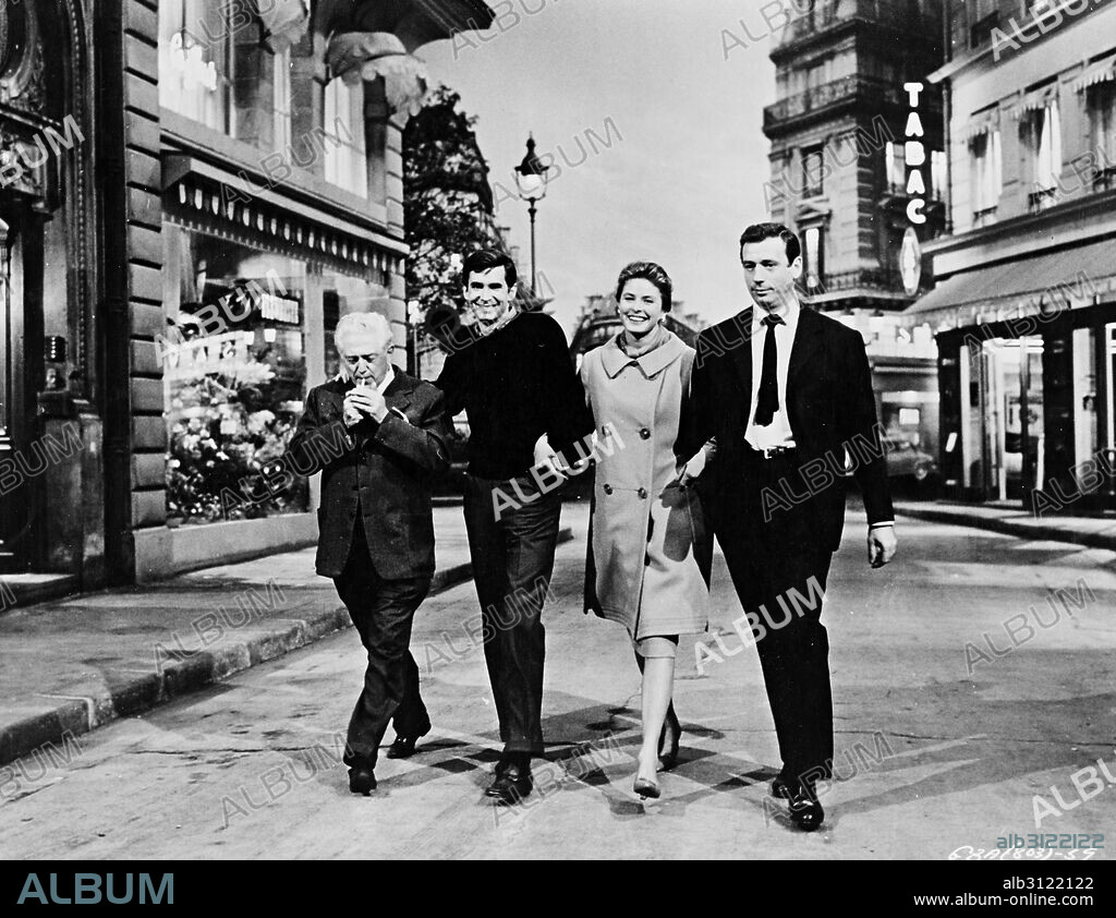 ANATOLE LITVAK, ANTHONY PERKINS, INGRID BERGMAN and YVES MONTAND in GOODBYE AGAIN, 1961, directed by ANATOLE LITVAK. Copyright UNITED ARTISTS.