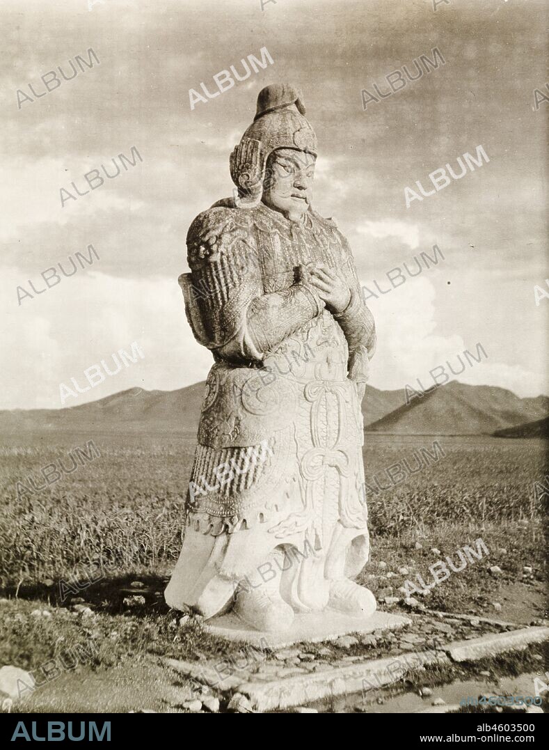 China, One of several ancient stone statues, depicting Chinese warriors in battle dress, that guide the way to the Ming Dynasty tombs. The site contains the mausoleums of 13 Emperors of the Chinese Ming Dynasty (1368-1644). Near Peking, (Beijing).Original manuscript caption: Priest or Statesman, [1909]. 1998/028/1/1/158.