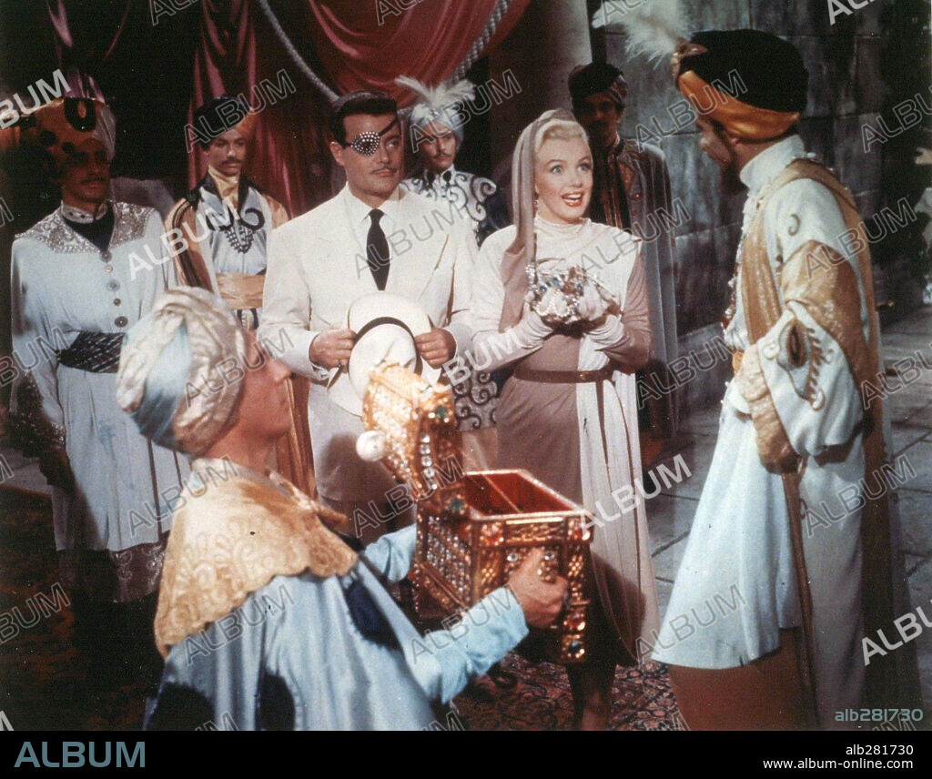 NORMA JEAN BAKER and ROY D'ARCY. MARILYN MONROE and ROY D'ARCY in HOW TO MARRY A MILLIONAIRE, 1953, directed by JEAN NEGULESCO. Copyright 20TH CENTURY FOX.