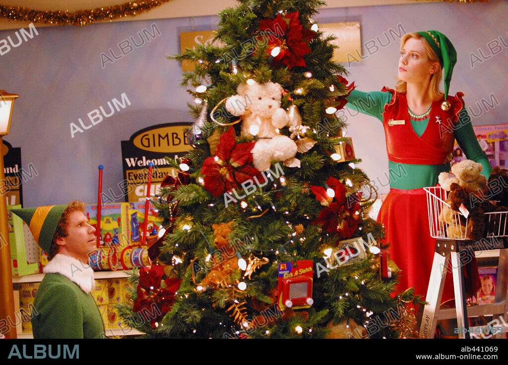 WILL FERRELL and ZOOEY DESCHANEL in ELF, 2003, directed by JON FAVREAU. Copyright NEW LINE PRODUCTIONS / MARKFIELD, ALAN.