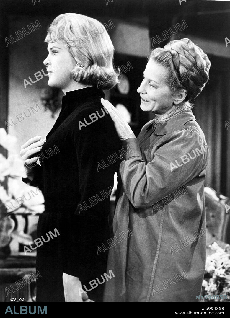 JOAN TOMPKINS and JOHN HANSEN in THE CHRISTINE JORGENSEN STORY, 1970, directed by IRVING RAPPER. Copyright UNITED ARTISTS.