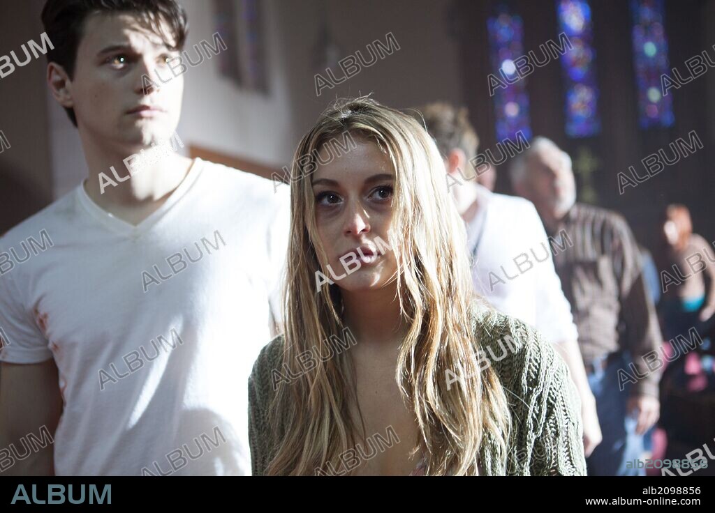 ALEXA VEGA and BRYAN DECHART in THE REMAINING, 2014, directed by CASEY LA SCALA. Copyright AFFIRM FILMS/CINEMATIC.