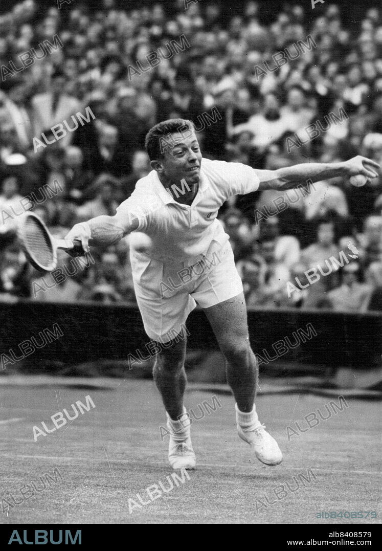 Trabert Beats Rose - Tony Trabert of the United States, favourite for this year's singles title, in play against Australia's Mervyn Rose during play at the Wimbledon Lawn Tennis Championships today. Trabert won 6-2, 6-2, 7-5. June 28, 1954. (Photo by United Press Photo).