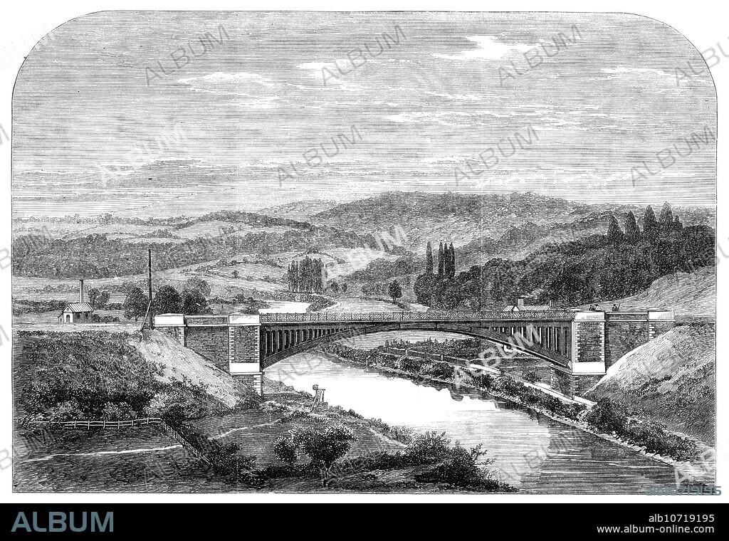 The Albert Edward Bridge of the Coalbrookdale Railway over the Severn, [Shropshire], 1864. Engraving '...from an excellent photograph taken by Mr. W. Fall, photographer, of Market-square, Ironbridge, Salop...It is singular that the bridge which forms the subject of our Illustration - the most recent and one of the most enterprising works of its class - is within sight of the first iron bridge that was constructed in  England - one which was constructed by the same ironmasters in 1779, and which has given a name to the rising and important town of Ironbridge, on the banks of the Severn'. Cast iron bridge designed by John Fowler. From "Illustrated London News", 1864.
