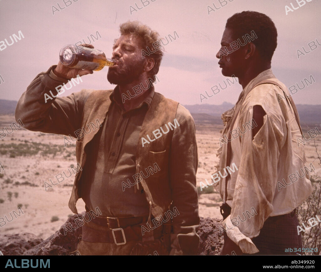 BURT LANCASTER and OSSIE DAVIS in THE SCALPHUNTERS, 1968, directed by SYDNEY POLLACK. Copyright UNITED ARTISTS.