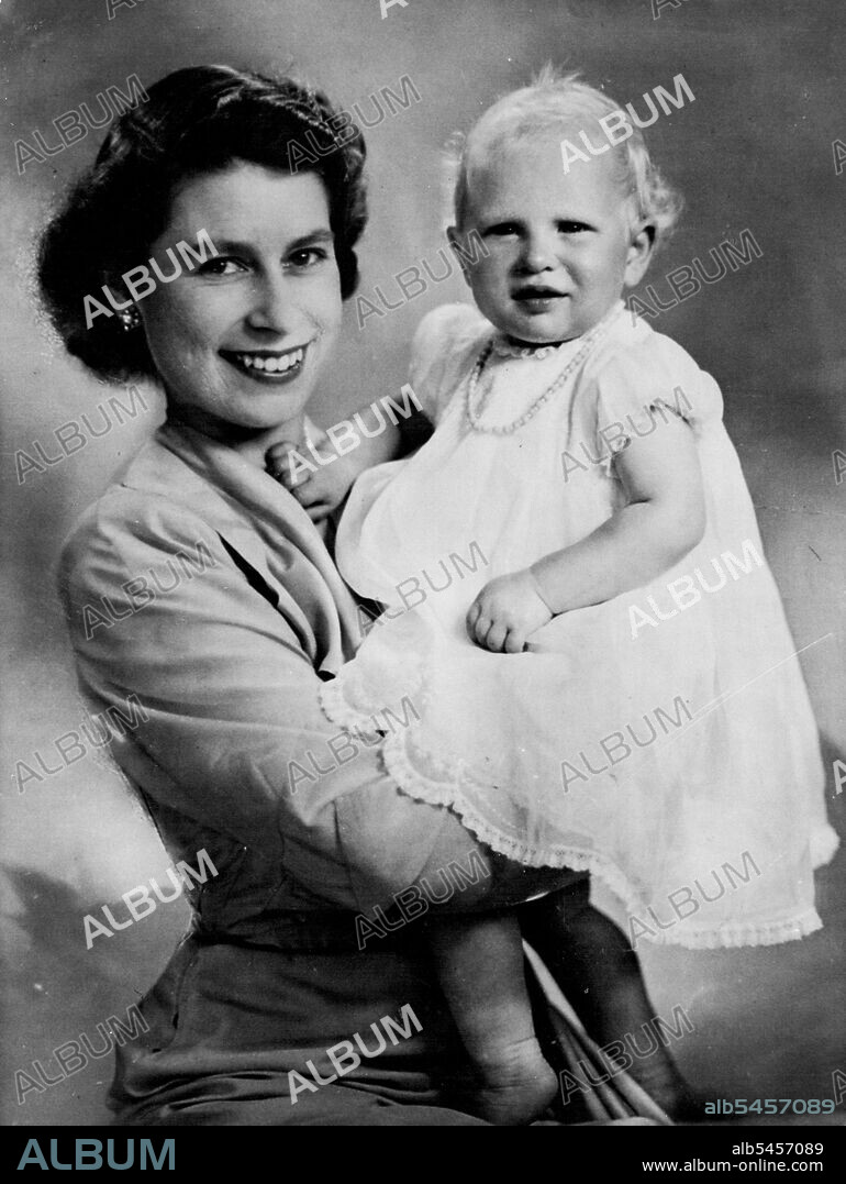 Princess Anne Is One -- A new portrait by Marcus Adams of T.R.H. Princess Elizabeth and her daughter Princess Anne, taken on the occasion of the baby Princess's first birthday. She is wearing the coral necklace used by her mother when she was photographed at the same age by Marcus Adams in 1927. August 14, 1951. (Photo by Associated Press Photo).