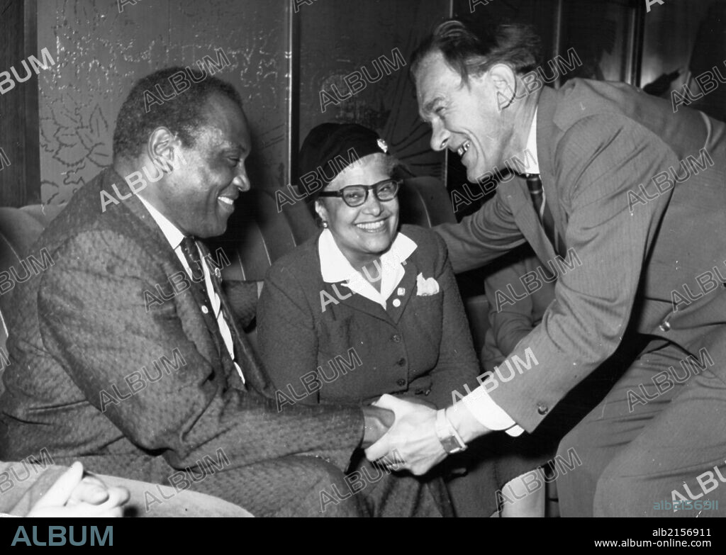 September 15, 1958. Professor Vaclav Dobias, Czechoslovakian Composer Welcoming Paul And Eslanda Robeson During Their Stop In Prague On Their Way From The Ussr To London. He Also Gave Him An Official Invitation To Participate At The International Prague Spring Musical Festival Of 1959. (Photo by: Sovfoto/UIG via Getty Images).