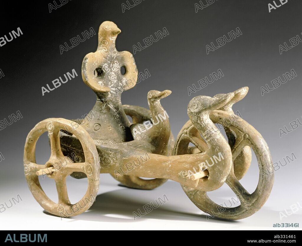 Votive object in shape of chariot with swans and idols, Clay, bronze Age, from Duljaja, Serbia.