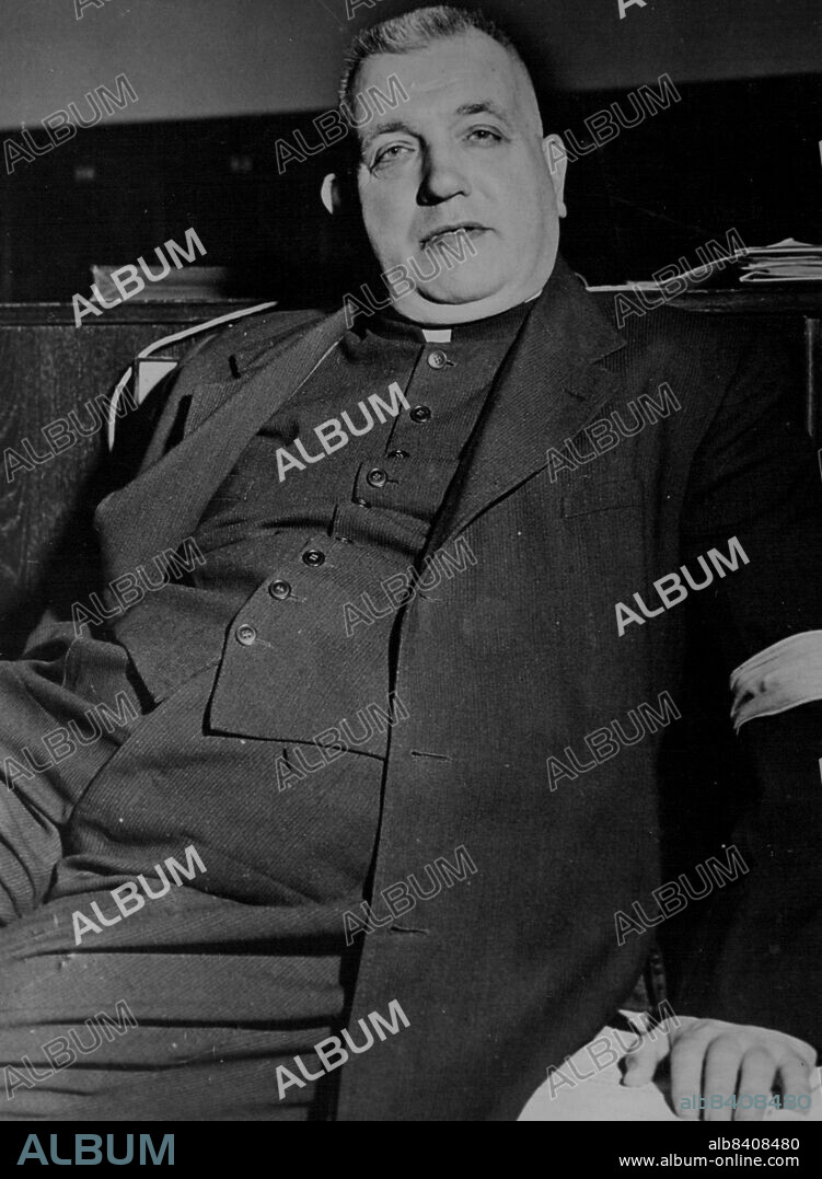 Trail Of Josef Tiso: III Capital Charges -- Josef Tiso Sits in The Bratislava court listening to the charges against him being read Dec 2.The trial of Josef Tiso, Roman Catholic President of Slovakia, on III Capital charges opened in Bratislava Dec 2. The 213-page indictment said the accused sought contact with Hitler, Goering, Ribbentrop and other leading Nazis to Enlist their help in severing Slovakia from the Czechoslovak state. The court overruled Defence counsel's contention that Tiso should be tried by an International court and claims to Parliamentary immunity for the prisoner. December 17, 1946. (Photo by Associated Press Photo).