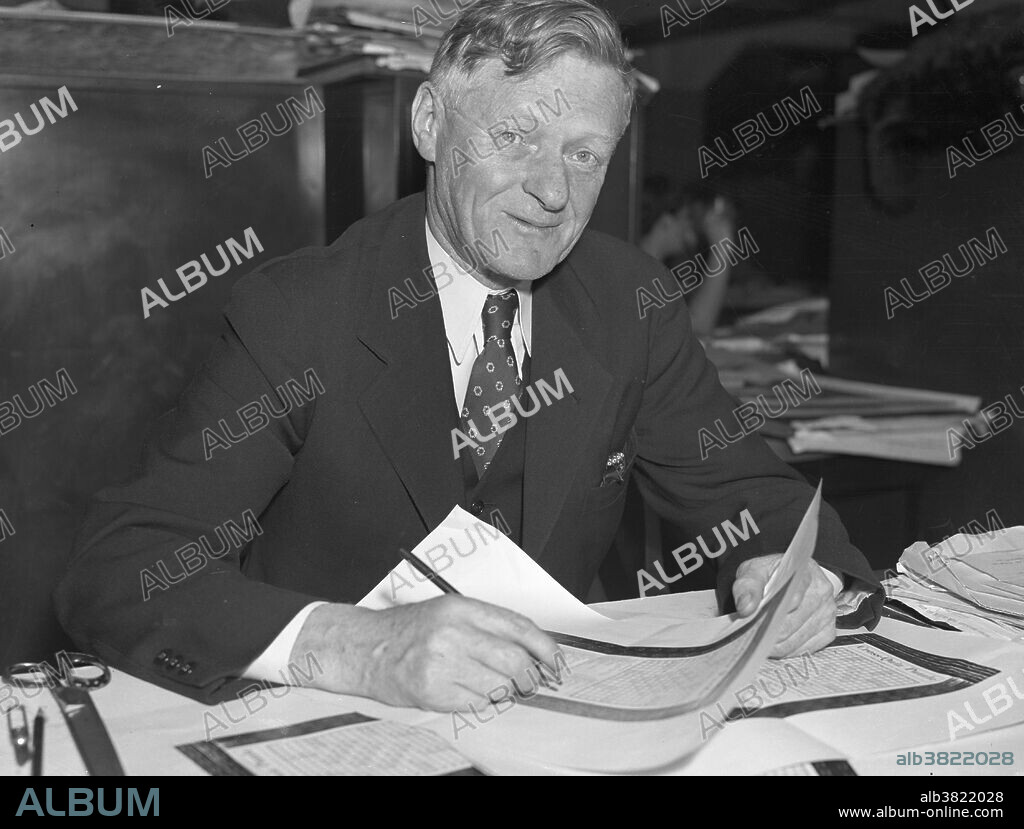 Arthur Wynne (June 22, 1871 - January 14, 1945) was the British-born inventor of the modern crossword puzzle. He emigrated to the United States on June 6, 1891, at the age of 19. He worked on the Pittsburgh Press newspaper, and played the violin in the Pittsburgh Symphony Orchestra. He later moved to New York City and worked on the New York World newspaper. While there he created the crossword puzzle for the "Fun" section of the Sunday edition (December 21, 1913). The puzzle had a diamond shape with a hollow center, and the letters F-U-N already being filled in. He called it a "Word-Cross Puzzle." He introduced a number of innovations and pioneered the use of black squares in a symmetrical arrangement to separate words in rows and columns. A few weeks after the first "Word-Cross" appeared, the name of the puzzle was changed to "Cross-Word" as a result of a typesetting error. He became a naturalized US citizen in the 1920s, and died in 1945 at the age of 73.