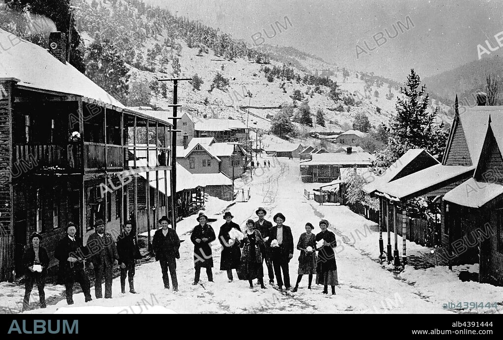 Negative - Woods Point, Victoria, circa 1920, The main street, Woods Point under snow. The Commercial Hotel is on the left, the post office on the left on the rise and voice's guest house on the right on the rise.