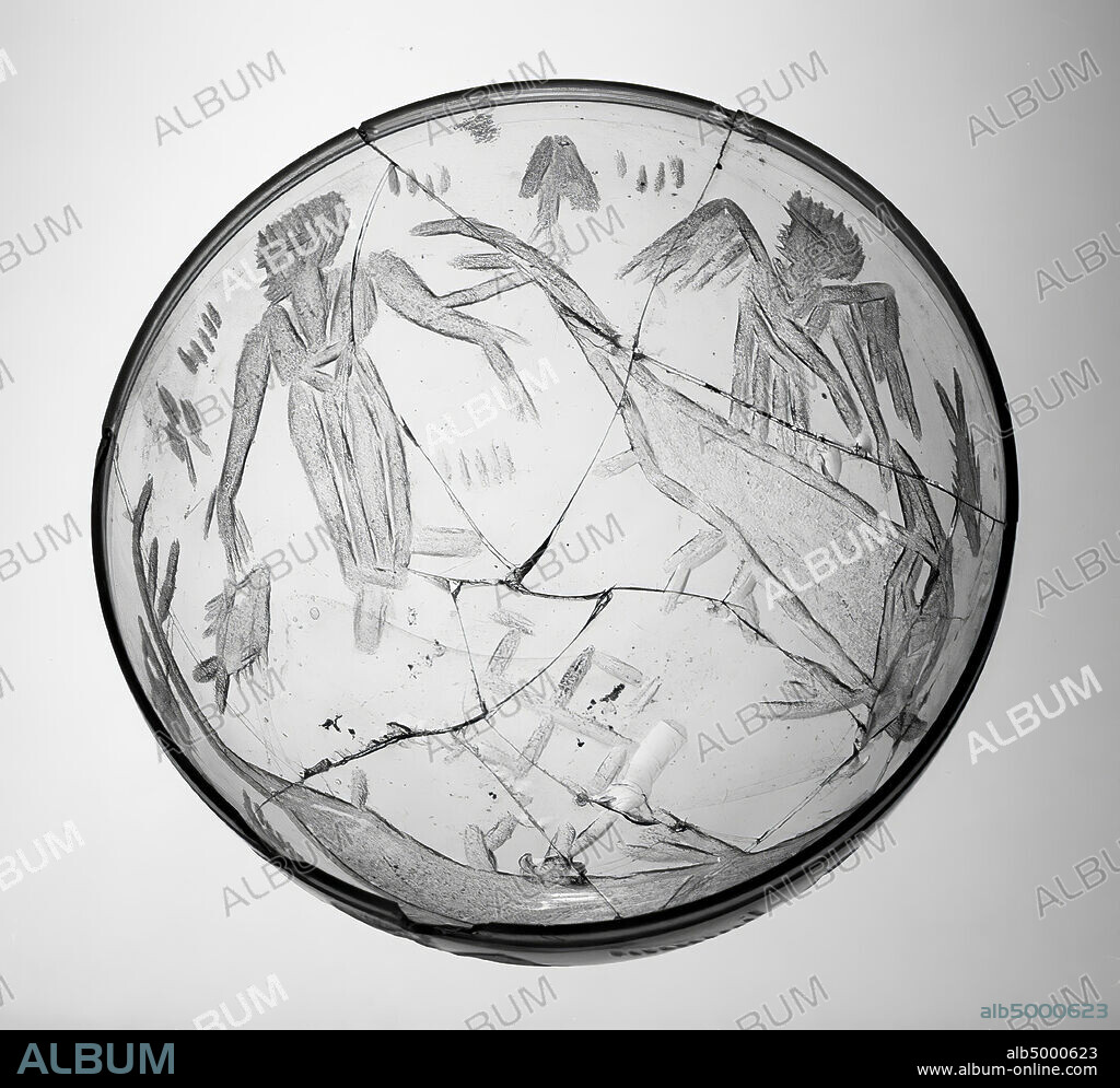 A small, spherical bowl of decolored glass with embossed reliefs. Christian representation: standing man wrapped in a long robe with a belt around his waist. He holds out his hands, slanting downwards. On either side of him are large, dolphin-like fish depicted on reins by winged figures (angels). A swastika is shown in the middle of the bottom. It possibly represents Jonas and the whale., Crockery, bowl, glass, cut, h. 5.3 cm, diam. 10 cm, Roman 300-400, the Netherlands, Gelderland, Nijmegen, Nijmegen.