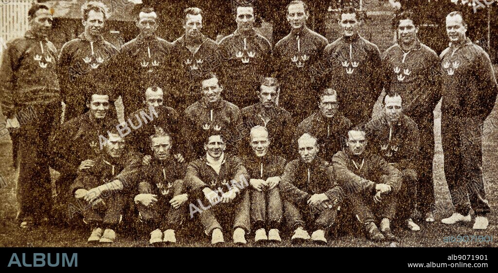 Photograph of the Swedish Olympic Champions. Standing from left: C.A. Ledin; Erik Nilsson; Bertil Nordhal; Sune Andersson; Knut Nordhal; Torsten Lindberg; Nils Liedholm; Gunnar Nordhal; Rudolf Kock. Kneeling, from left: Karl Svensson; Gunnar Gren; Ingvar Rydell; Börje Leander; 'Bian' Rosengren; Stig Nystrom; Front row, from left: George Raynor; Rune Emanuelsson; 'Gravis' Carlsson; Kjell Rosen. Dated 1948.