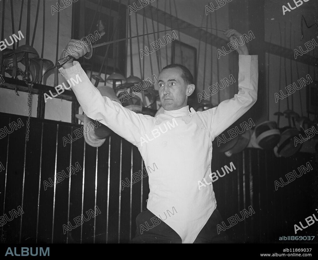 POISE OF A MASTER - NEW FENCING COACH FROM FRANCE. Professor ROGER CRISNIER who has been appointed coach to the Amateur Fencing Association , photographed at the Association's London headquarters . A Frenchman who speaks English with a Scottish accent because he was born in Scotland and studies in Edinburgh University , he is reputed to be one of the World's finest fencers. He was advisor and trainer to the French Olympic Fencing team . A professor of fencing , he has taught in Edinburgh and Dublin . The Ministry of Education made a grant to bring him to London from Paris . 26 January 1949.