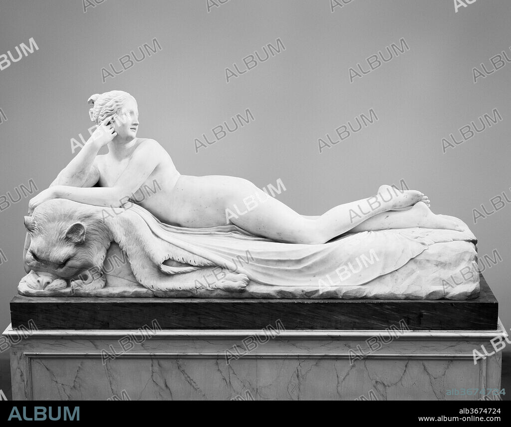ANTONIO CANOVA (ITALIAN, POSSAGNO 1757-1822 VENICE), AND HIS STUDIO. Reclining Naiad. Artist: Antonio Canova (Italian, Possagno 1757-1822 Venice) , and his studio. Culture: Italian, Rome. Dimensions: Overall (wt. confirmed): 35 × 75 × 32 1/2 in., 2558 lb. (88.9 × 190.5 × 82.6 cm, 1160.3 kg). Patron: Commissioned by John Bligh, 4th Earl of Darnley. Date: 1819-24.
This is a variant of the Reclining Venus with Cupid, now in Buckingham Palace, which was made for Lord Cawdor in 1814 and ceded by him to the Prince Regent.  1970.1, commissioned by the fourth earl of Darnley, was completed by Canova's assistents after his death and delivered to the earl at Cobham Hall in Kent in 1824. The original plaster model for the Naiad, completed in 1817, is in the Gipsoteca di Possagno.  Compositional prototypes include Canova's Pauline Borghese as Venus Victrix and an ancient Hermaphrodite, both in the Borghese Gallery, Rome. Numerous slight indentations throughout the marble may be visible remains of the pointing system.
