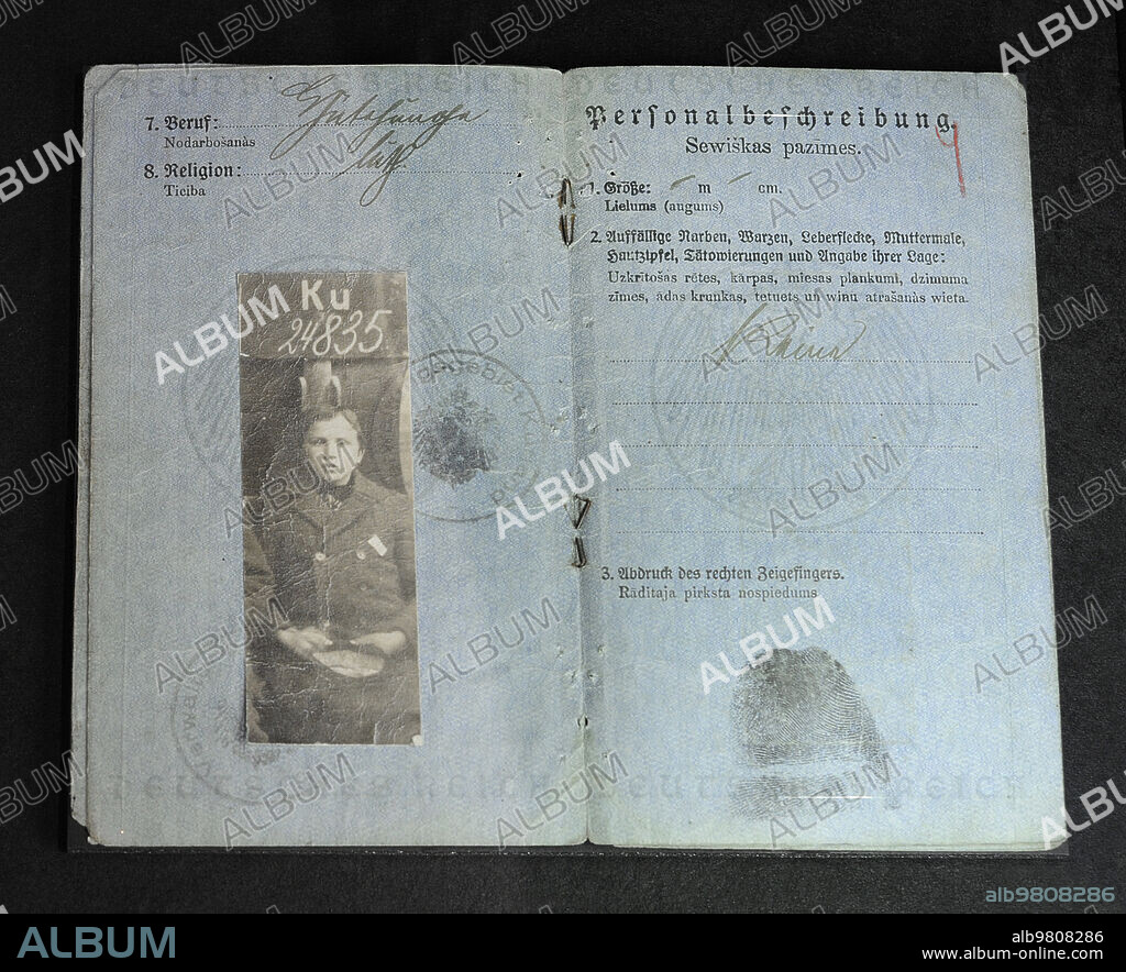 First World War (1914-1918). Latvia. Passport issued by the Ober Ost (1914-1919) to Kurzeme residents. All citizens of Kurzeme and Zemgale who had reached the age of 10 during the German occupation were issued an Ober Ost passport. The document included a photo, a unique identification number, fingerprints, and the code of the Ober Ost administrative region (Kurzeme: Ku). Each district created a file of all citizens with their respective passport numbers. Latvian War Museum. Riga.