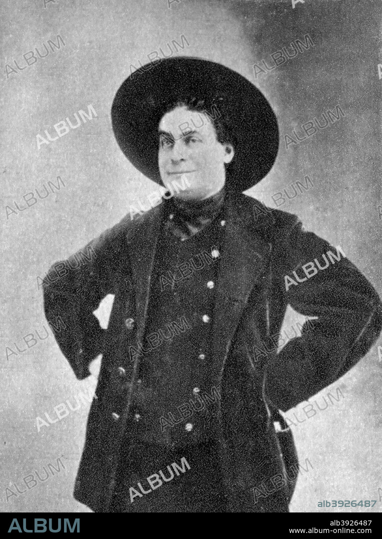 Aristide Bruant, French cabaret singer, comedian and nightclub owner, 1901. Bruant (1851-1925) was a friend of the artist Henri de Toulouse-Lautrec and featured on a famous poster by the artist, in which he is depicted wearing a red scarf and a black hat and cape. A photograph from Album de Photographies, Dans L'Intimite de Personnages Illustres, 1855-1915, Editions MD, 22 Rue de L'Arcade, Paris 8, 1855-1915.