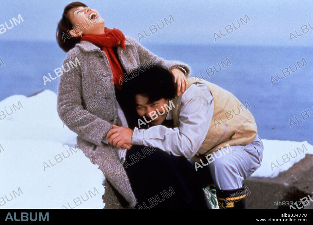 KOJI YAKUSHO and MISA SHIMIZU in WARM WATER UNDER A RED BRIDGE, 2001 (AKIA HASHI NO SHITA NO NURUI MIZU), directed by SHOHEI IMAMURA. Copyright NIKKATSU CORPORATION/IMAMURA PRODUCT./MARU LIMITED/BAP INC.