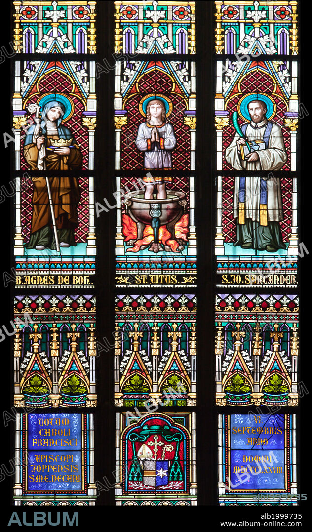 Prague, St. Vitus Cathedral, Stained Glass Window, St. Agnes of Bohemia, St. Vitus, St. Sarcander. Stained Glass Window depicting from left to right St. Agnes of Bohemia, St. Vitus, St. Sarcander.