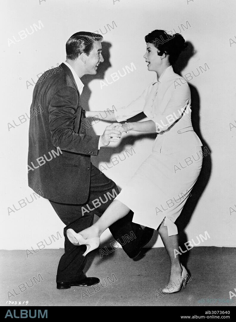 COLLEEN MILLER and LESLIE NIELSEN in HOT SUMMER NIGHT, 1957, directed by DAVID FRIEDKIN. Copyright METRO-GOLDWYN-MAYER.