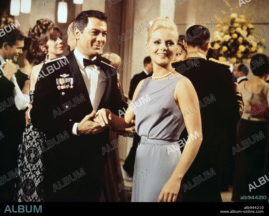 TONY CURTIS and VIRNA LISI in NOT WITH MY WIFE, YOU DON'T!, 1966, directed by NORMAN PANAMA. Copyright WARNER BROTHERS.
