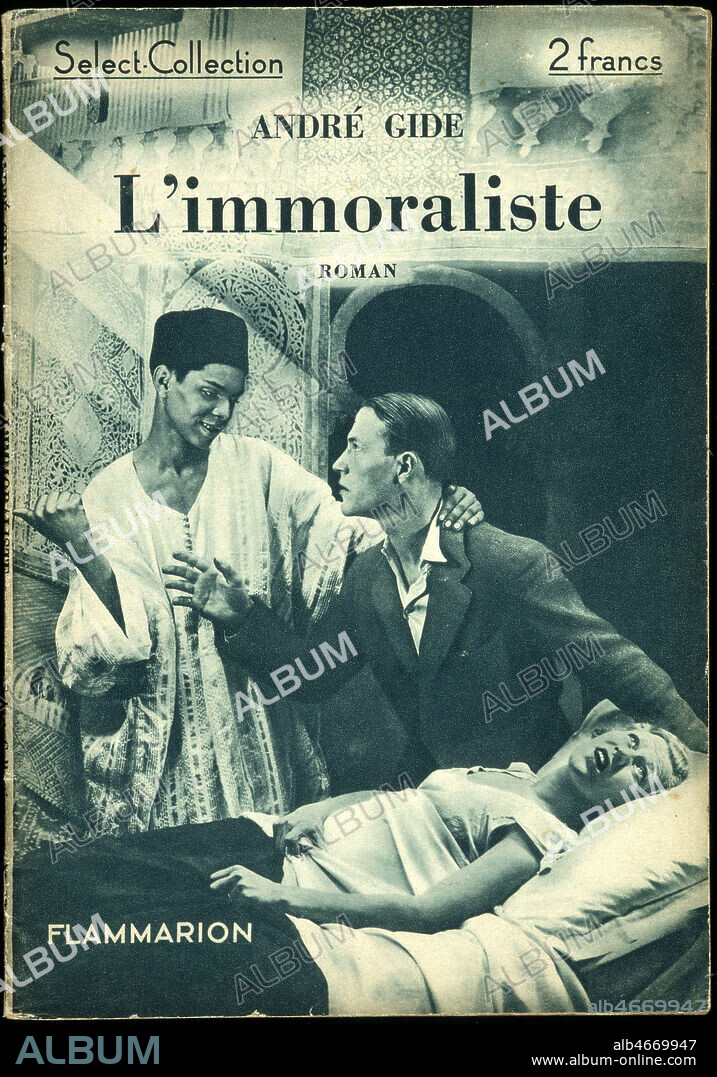 Andre GIDE : Couverture de L'Immoraliste, roman. Edition Flammarion, 1935. En Algerie, le heros assiste a la mort lente de sa femme, tandis qu'un jeune adolescent algerien le prend par le cou, semblant lui proposer de venir avec lui. Couverture explicite pour le roman de GIDE, parlant de sa frequentation de jeunes garcons algeriens pendant ses nombreux voyages au Maghreb : André Gide fait la description suivante du petit biskri Bachir, personnage fantasmatique de son roman L¿Immoraliste : « La gandourah, un peu tombée, découvre sa mignonne épaule. J¿ai besoin de le toucher. Je me penche. Il se retourne et me sourit. »... Credit Collection Kharbine Tapabor.