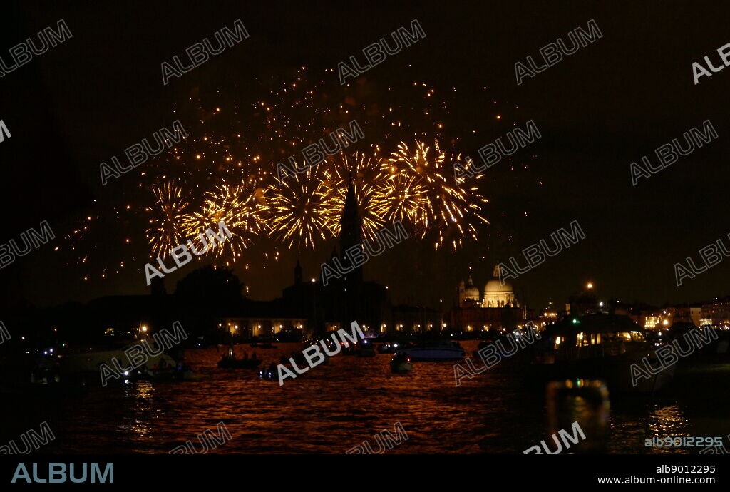 Fireworks in Venice marking the Redentore Festival; held on the day of the Feast of the Most Holy Redeemer, to give thanks for the end of the terrible plague of 1576, which killed 50,000 people.