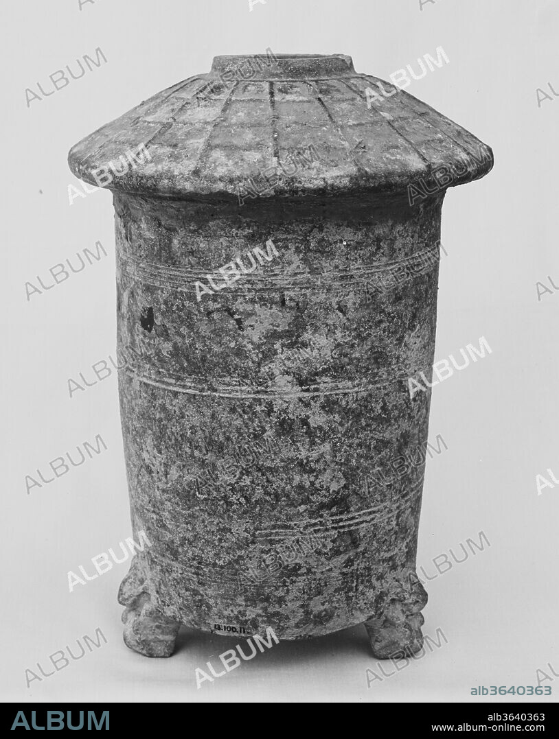 Granary Tower. Culture: China. Dimensions: H. 12 1/8 in. (30.8 cm); Diam. 8 1/4 in. (21 cm). Date: 1st-early 3rd century.
Pottery models of houses and farm structures were commonly included in Eastern Han burials to provide for the afterlife.