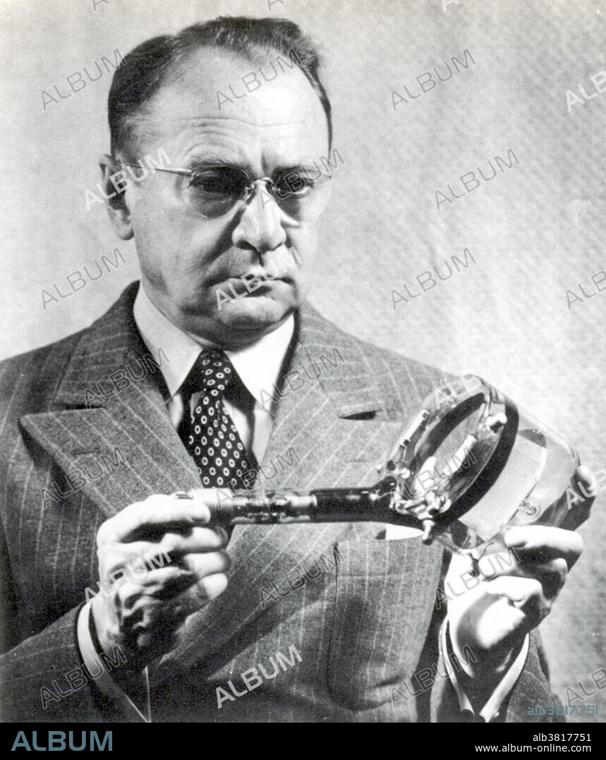 Editorial use only . Zworykin holding an iconoscope, an early television camera tube. Vladimir Kosmich Zworykin (1888-1982), Russian-American inventor, engineer, and pioneer of television technology. In 1919, he emigrated to the United States to work at the Westinghouse laboratory in Pittsburgh. In 1929, he invented the cathode-ray tube called the kinescope and was one of the first to demonstrate a television system with all the features of modern picture tubes. Having developed the prototype of the receiver by December, Zworykin met David Sarnoff, who hired him and put him in charge of television development for RCA at their newly established laboratories in Camden, New Jersey. In 1931 he invented a new type of cathode ray transmitter, that he named Iconoscope, which became the leading camera tube used for TV broadcasting.
