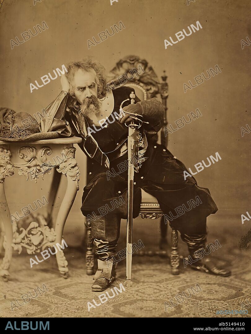 Friedrich Haase as Oliver Cromwell in Die Republikaner - from a portfolio for Chéri Maurice for his fiftieth anniversary as director at the Thalia Theater in Hamburg, albumin paper, black and white positive process, image size: height: 31.3 cm; width: 24.7 cm, unsigned, inscribed: recto and in the middle of the box: in ink: Oliver Cromwell, The Republicans, portrait photography, actor, actress, cutting and stabbing weapons, portrait, theater costume, sitting figure, specific poses, gestures, facial expressions, full-length portrait, Friedrich Haase.